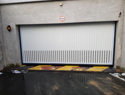 Porte de garage  métal à Roissy (95)